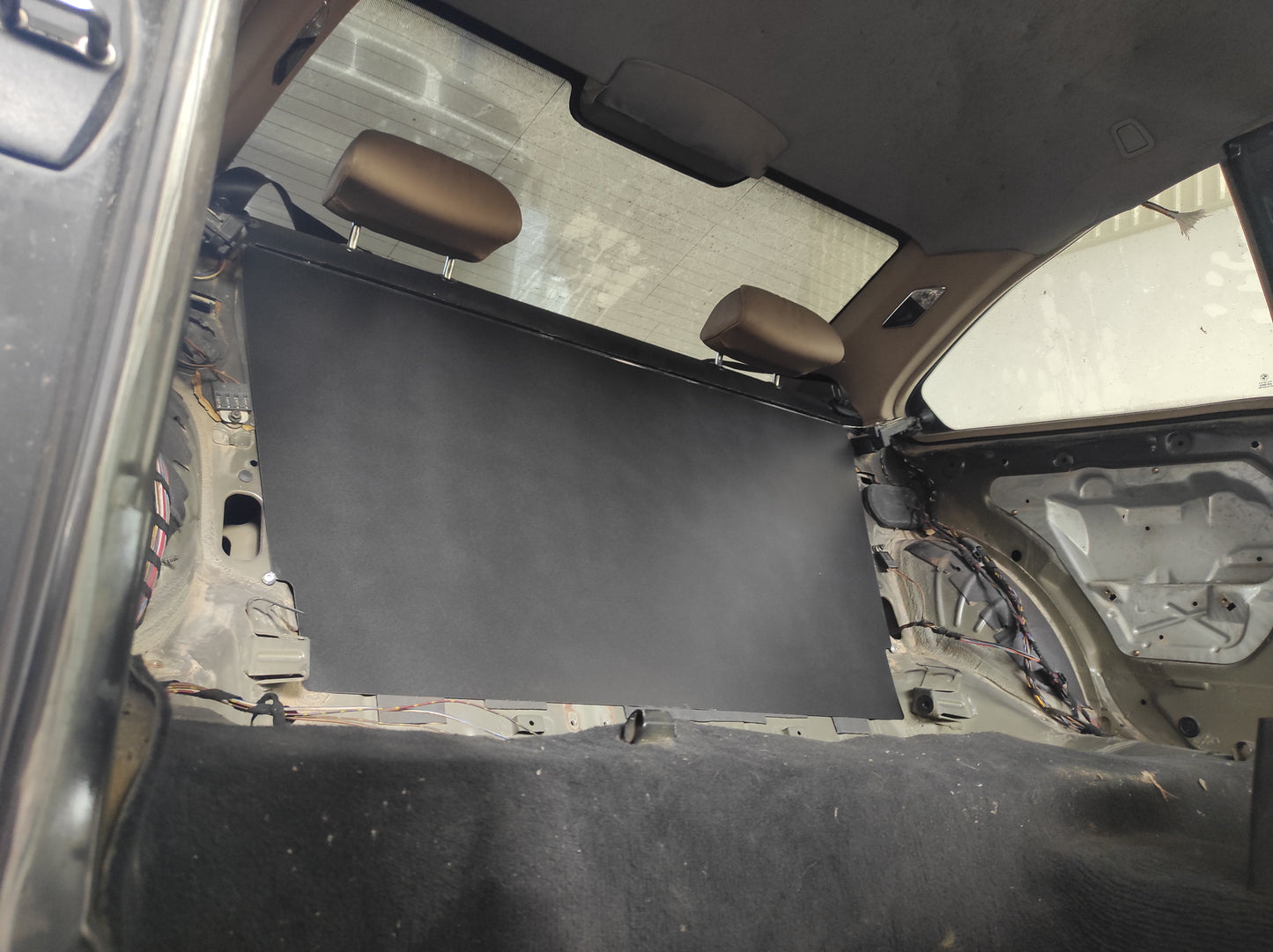 Trunk separation panel for BMW E46 Coupe.